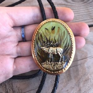 Vintage bolo tie. Moose gold tone artisan design